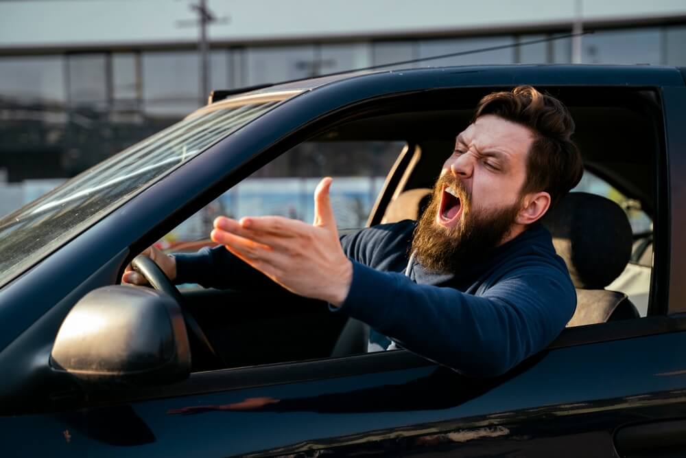 What Is the Difference Between Aggressive Driving and Road Rage?